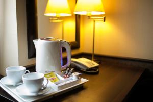 Príslušenstvo na prípravu kávy alebo čaju v ubytovaní Hotel Wielopole