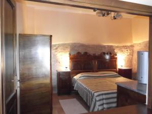 En eller flere senger på et rom på A Casa Di Mì Appartamenti vacanza