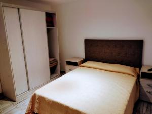 Una cama o camas en una habitación de Condominio Plaza Italia - Cochera gratis