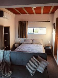 מיטה או מיטות בחדר ב-Lavandas del Mar
