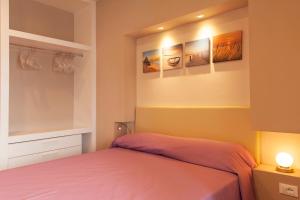 Voodi või voodid majutusasutuse Hotel l'Approdo toas