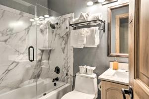 a bathroom with a shower and a toilet and a sink at Truckee Home with 2 Balconies Less Than 1 Mi to Skiing! in Truckee