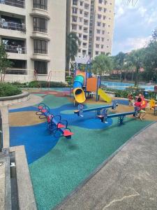a childrens playground with slides and slidesktop at CASA TROPICANA - 2-Room CONDO with facilities in Petaling Jaya