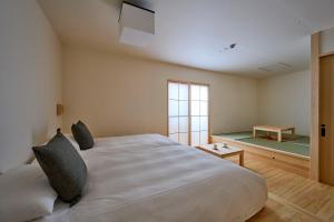 Llit o llits en una habitació de yubune