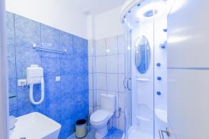 A bathroom at All Saints Villas