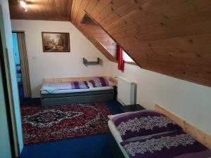 Postel nebo postele na pokoji v ubytování Pension Lípa