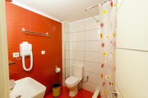 A bathroom at All Saints Villas