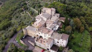 an aerial view of a large castle in a forest at Maison Vannina in Marsciano