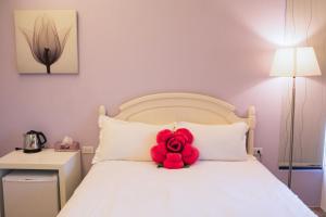 Postel nebo postele na pokoji v ubytování Ting Shuan B B&B