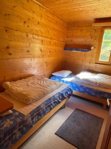 Letto o letti in una camera di Chalet Singlinaz
