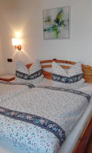 Postel nebo postele na pokoji v ubytování Ferienwohnungen Fahringer Diana
