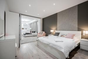 Posteľ alebo postele v izbe v ubytovaní BpR CALYPSO Home with A/C
