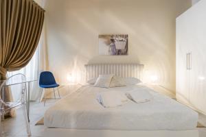 A bed or beds in a room at APPARTAMENTO AL CASTELLO