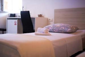 Postel nebo postele na pokoji v ubytování Guesthouse Miranda NP Krka