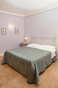 Katil atau katil-katil dalam bilik di Il Borgo del Fattore B&B