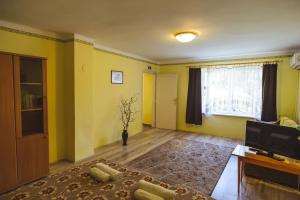Postel nebo postele na pokoji v ubytování Tolnay Kúria és Vendégház