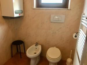 Koupelna v ubytování Appartamenti Il Capomandro