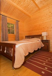 Ένα ή περισσότερα κρεβάτια σε δωμάτιο στο Coolanowle Self Catering Holiday Accommodation