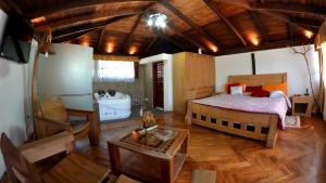 Letto o letti in una camera di Hosteria San Jose de Sigchos