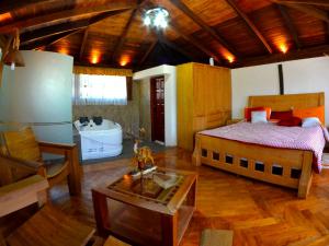 Letto o letti in una camera di Hosteria San Jose de Sigchos