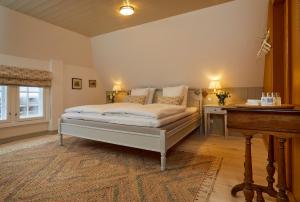 En eller flere senge i et værelse på Schackenborg Slotskro