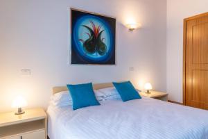 Postel nebo postele na pokoji v ubytování Hotel New Genziana