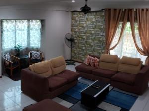Posezení v ubytování D'Hartamas Guesthouse