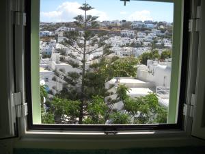Nespecifikovaný výhled na destinaci Mykonos nebo výhled na město při pohledu z penzionu