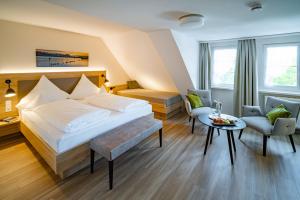 Postel nebo postele na pokoji v ubytování Landgasthof Keller + 37 fotografií