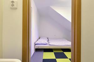 Letto o letti in una camera di Chata Myslivna