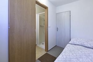 Letto o letti in una camera di Chata Myslivna