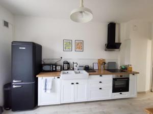 Dapur atau dapur kecil di Les Rauches - Quai Loire - Suite Love