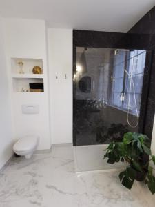 Ett badrum på Les Rauches - Quai Loire - Suite Love