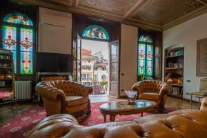 Posezení v ubytování Corte Realdi Suites Piazza Erbe