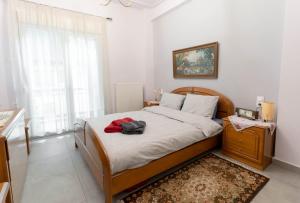 A bed or beds in a room at BYT Downtown Flat