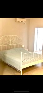 Postel nebo postele na pokoji v ubytování Villa Amari