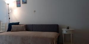 Postel nebo postele na pokoji v ubytování Apartman Lapis
