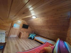 an overhead view of a room in a log cabin at Apartament Ruska Bania Na Pograniczu in Lasowka