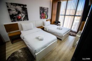 Hotel Restorant Delisia客房内的一张或多张床位