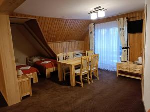 Posteľ alebo postele v izbe v ubytovaní Willa Alicja