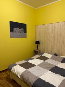 Säng eller sängar i ett rum på La cantoniera dei 18