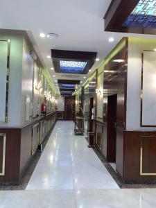 an empty hallway in a building with a hallway at Elite Furnished Units in Riyadh