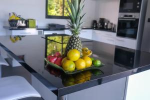 Kuchyň nebo kuchyňský kout v ubytování Caribbean’ZEN