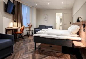 Postel nebo postele na pokoji v ubytování Go Hotel Saga