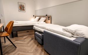 Postel nebo postele na pokoji v ubytování Go Hotel Saga
