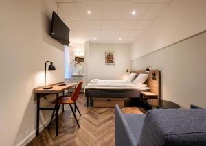 Postel nebo postele na pokoji v ubytování Go Hotel Saga