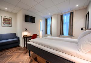 Postel nebo postele na pokoji v ubytování Go Hotel Saga