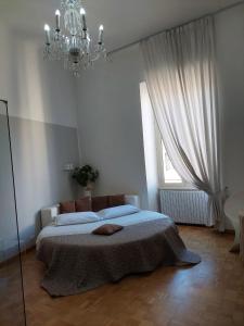 Posteľ alebo postele v izbe v ubytovaní Apartment Rome 18