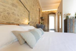 Postel nebo postele na pokoji v ubytování Innesti B&B