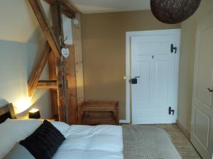 Postel nebo postele na pokoji v ubytování Minicamping und B&B Apartment Hintergarten
